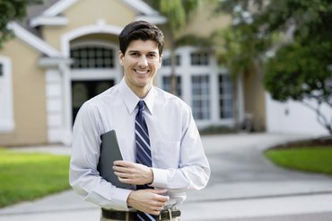 Broker in front of house