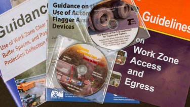 Assorted training pamphlets and CDs