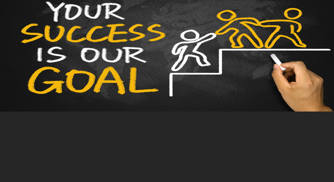 Picture of a hand writing Your Success is Our Goal on a chalkboard