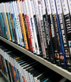 DVDs stacked up on a shelf
