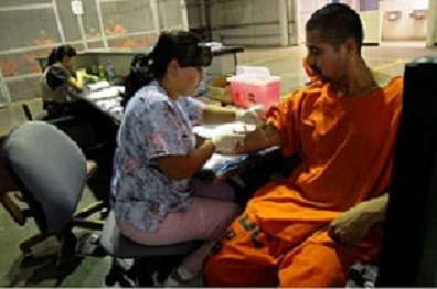 Incarcerated man getting blood drawn