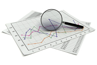 Charts and graphs with a magnifying glass