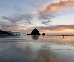 View of Haystack Rock from Cannon Beach ocean shore