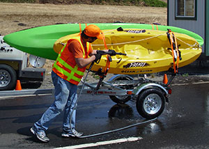 Boat inspection station decontaminating kayaks entering Oregon from a contaminated waterbody with quagga mussels