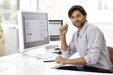 Business person working at a computer.