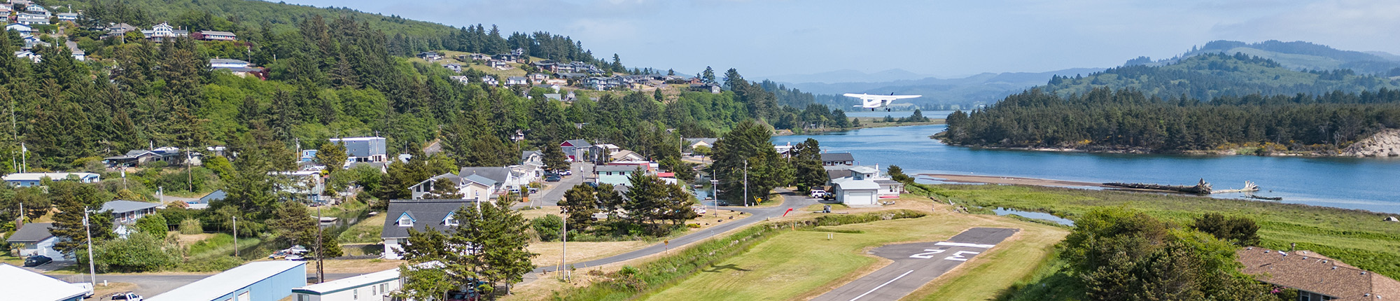small planes parked on runway