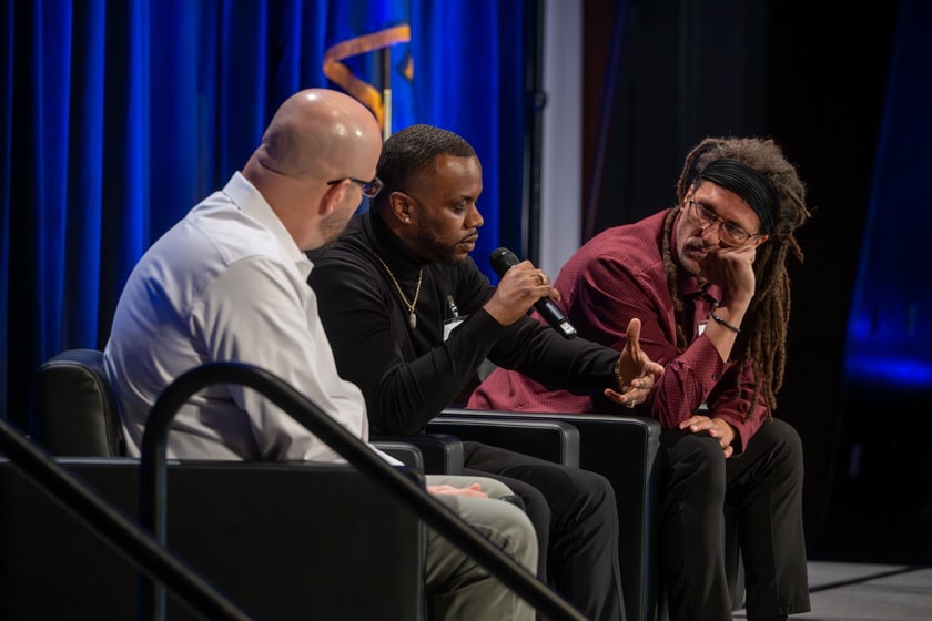 Panelists with lived experience discuss reintegration during Plenary 1