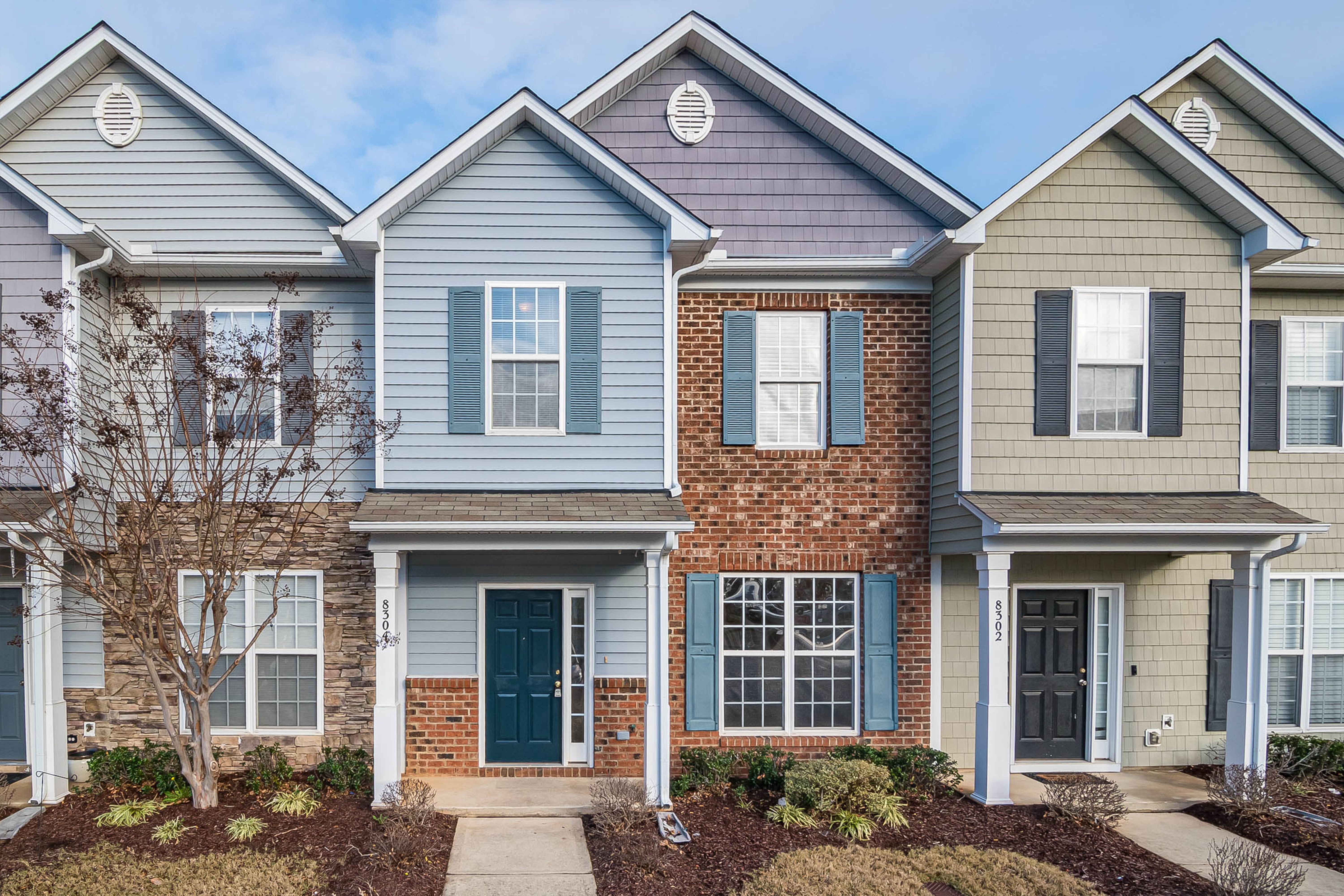 Three townhomes next to each other
