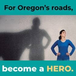 A woman stands tall casting a shadow of herself wearing a cape. Around her the words: For Oregon roads, become a hero. 