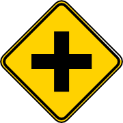 Señal de intersección en cruz de cuatro vías