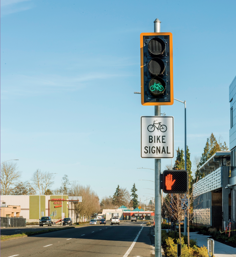 Image - a bike traffic light signal with a sign that reads Bike Signal.