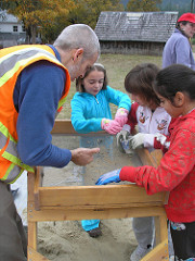 ODOT staff show students how to search for artifacts