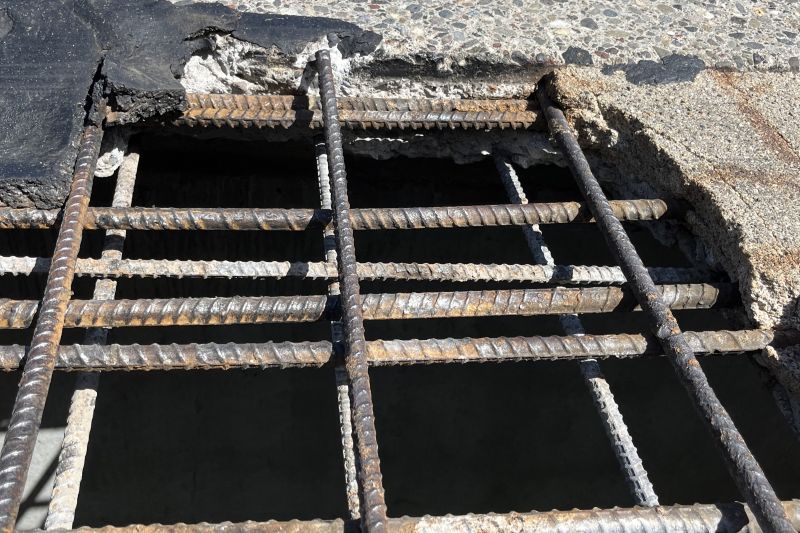 Close up of the hole after crew member prepped the area for the repair, spring 2026.