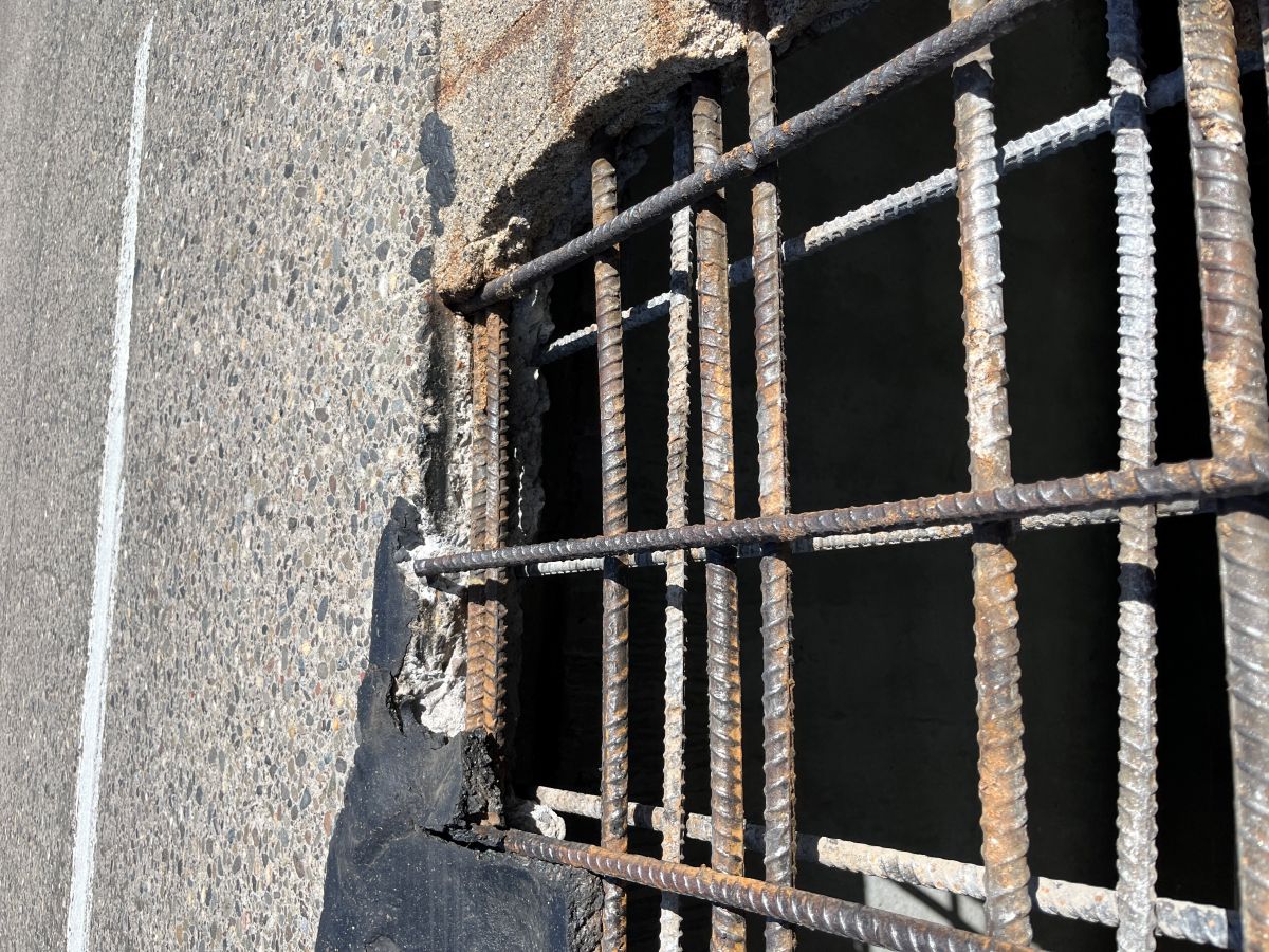 Close up of the hole after crew member prepped the area for the repair, spring 2026.