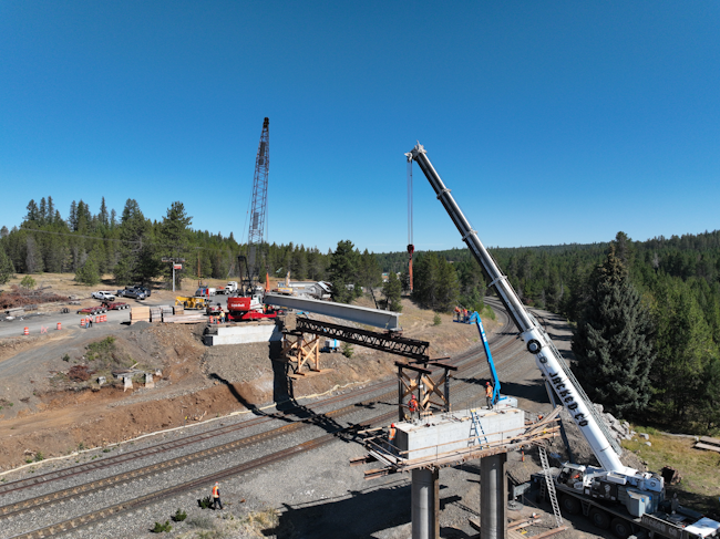 Aerial view of bridge girder placement.