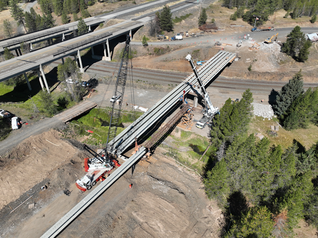 Aerial view of bridge girder placement.