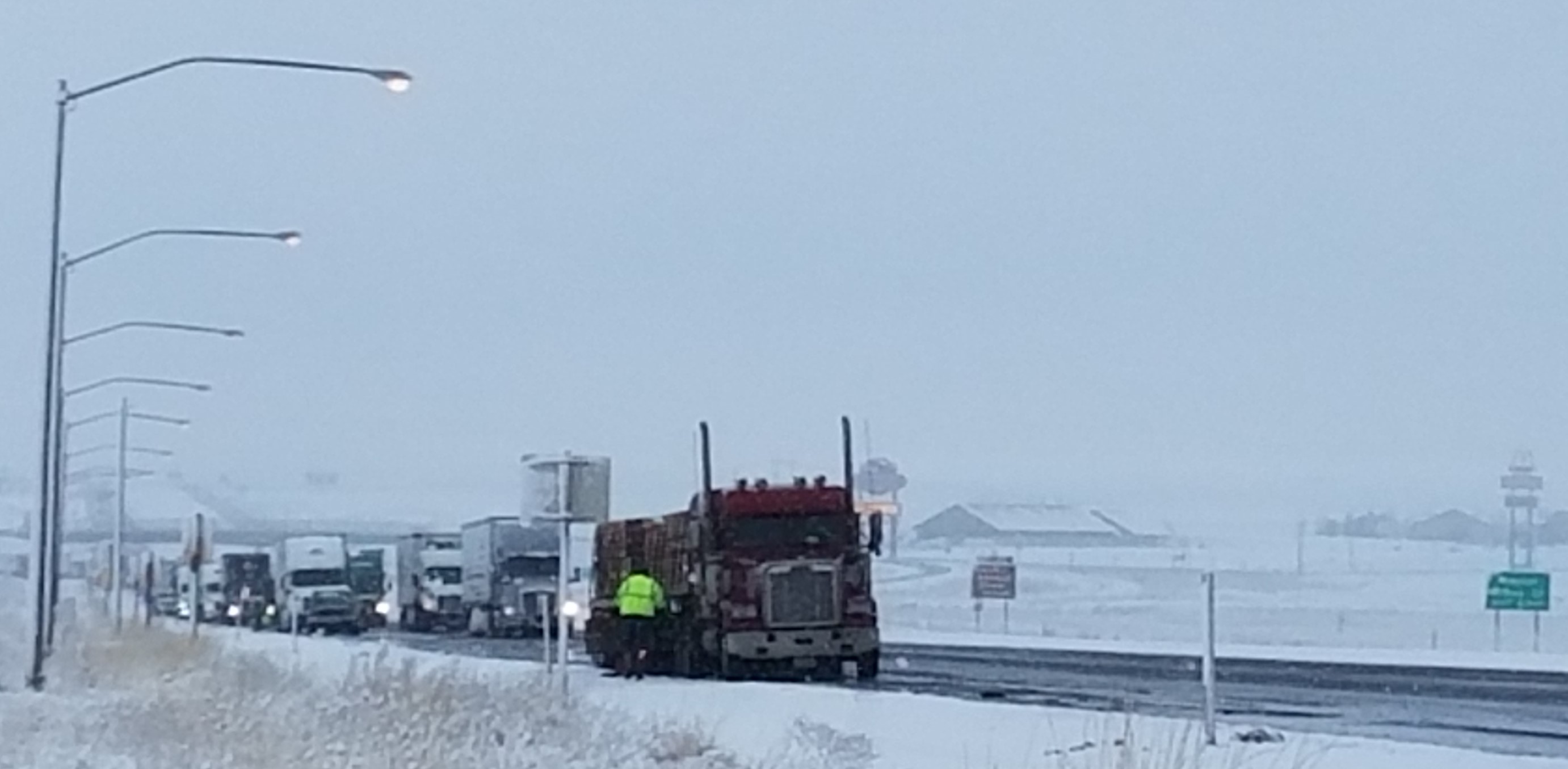 Image of semi trucks lined up at Exit 216 east of Pendleton.