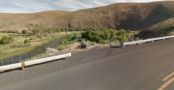 Image of old guardrail on the left and new guardrail on the right.