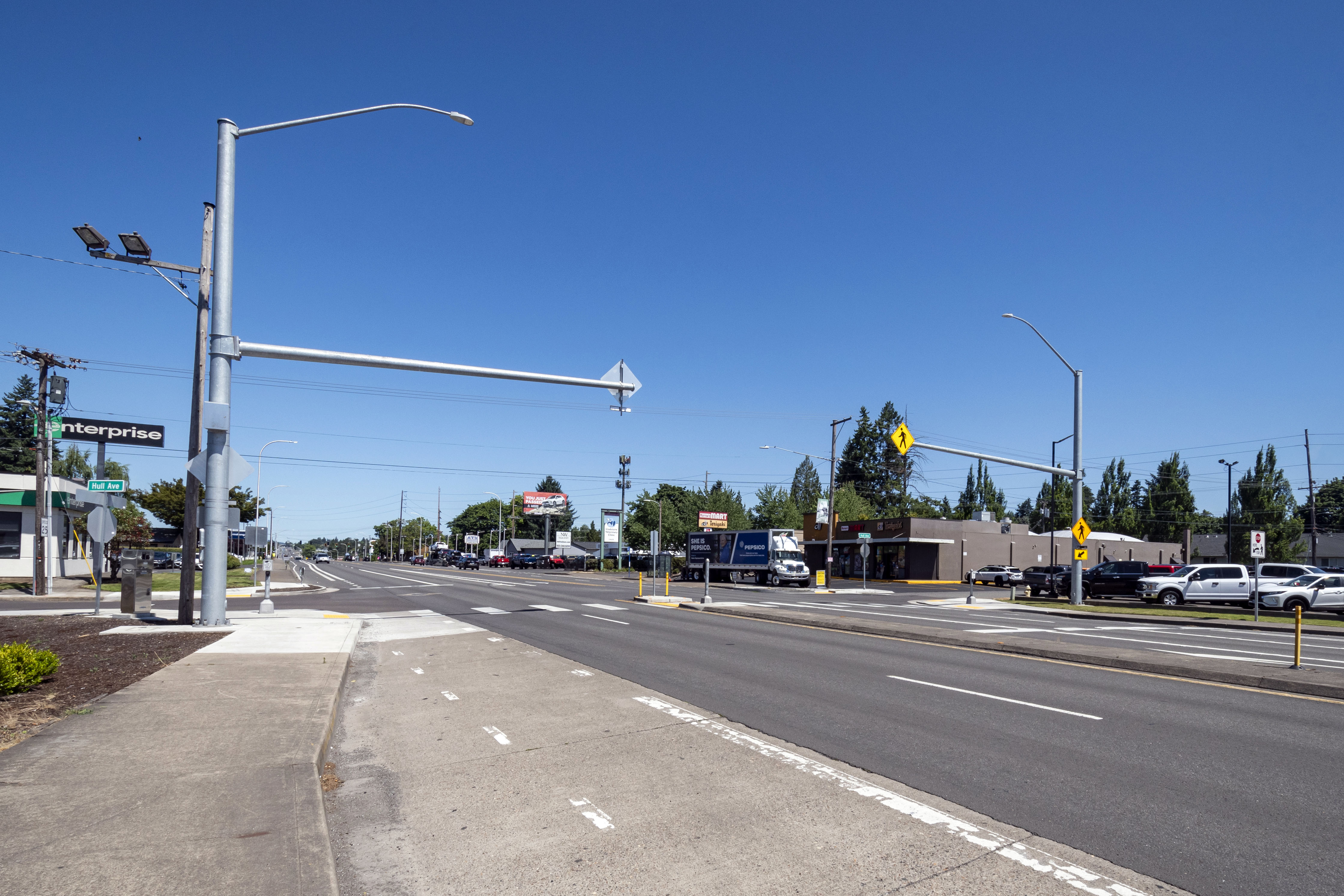 A photo of an enhanced crossing installed at a different location on OR99E.