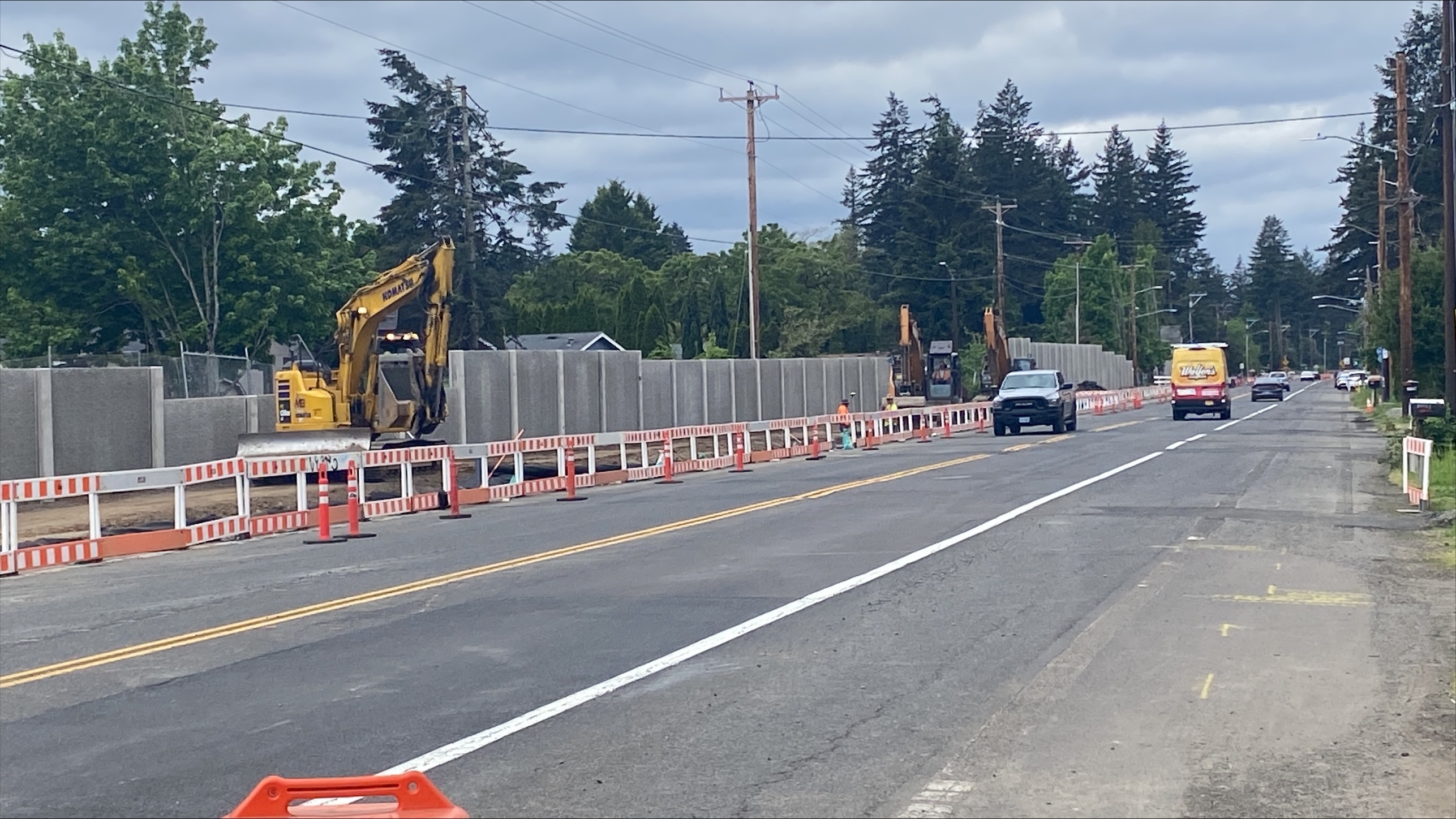 A picture of a new sidewalk being built on SE Powell Blvd. near SE 174th Ave.