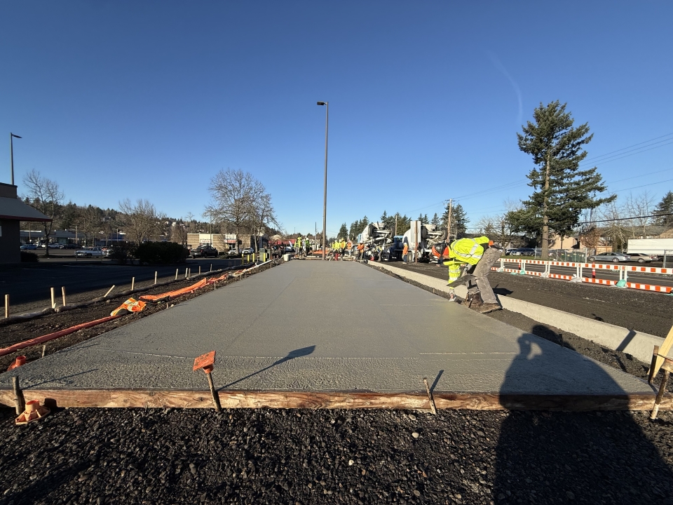 A picture of a new sidewalk being built on SE Powell Blvd. near SE 174th Ave.