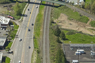 Aerial view of OR 99E in Canby with the overcrossing bridge at the top of the frame
