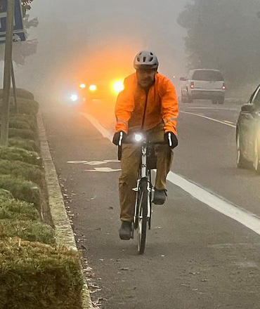 Cyclist in fog