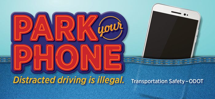 Park Your Phone. Distracted driving is illegal. Billboard