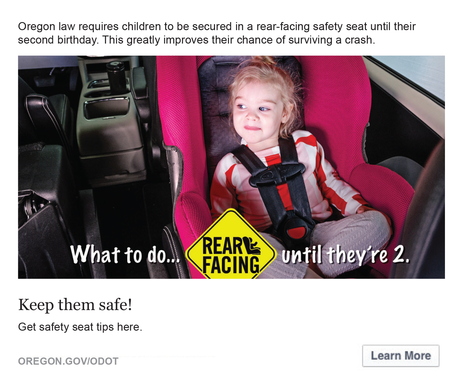 Image of a small girl sitting in a rear facing car seat