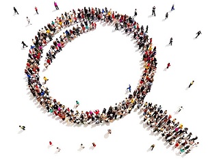 graphic with people in gathered in the shape of a magnifier