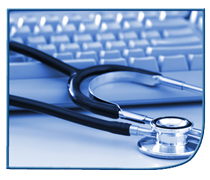 Stethoscope draped over a computer keyboard
