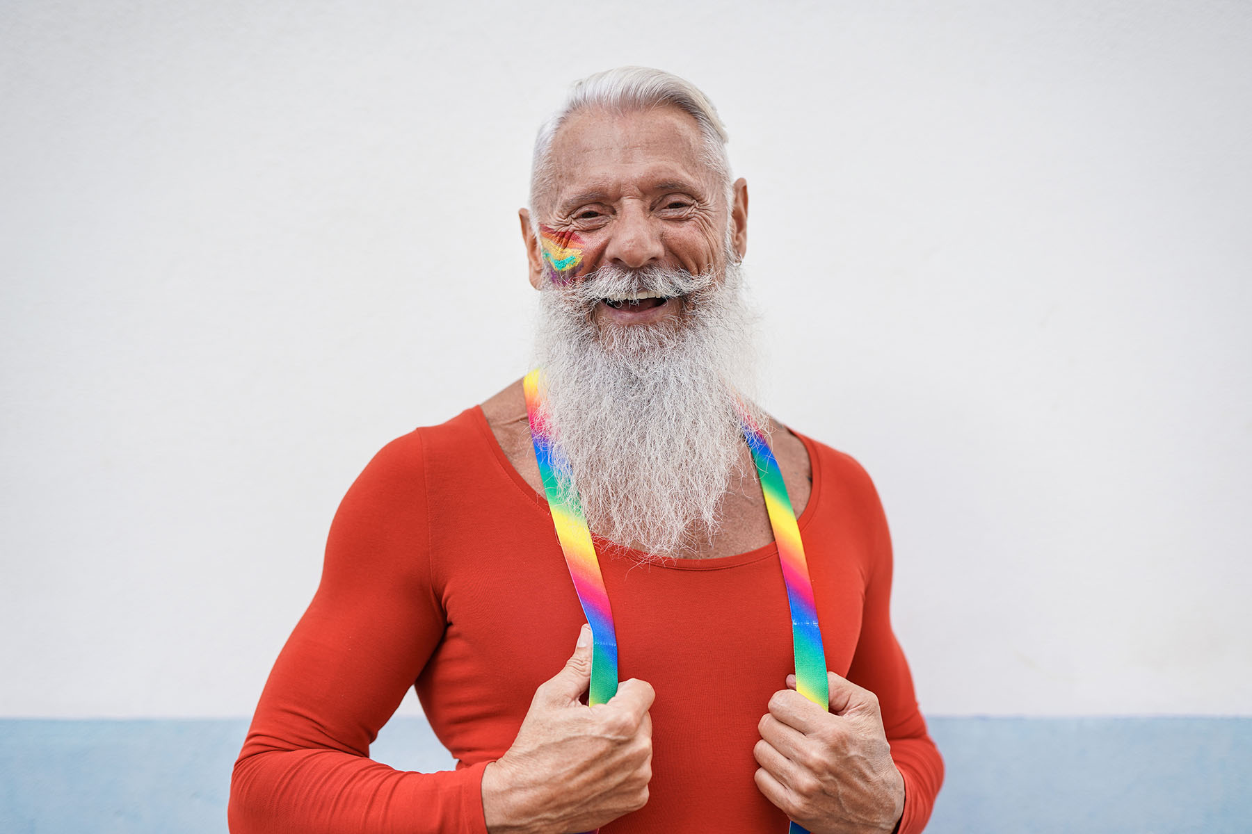 Portrait of hipster senior man laughing at gay pride parade - Concept of lgbt and homosexual love Portrait of hipster senior man laughing at gay pride parade - Concept of lgbt and homosexual love older gay men stock pictures, royalty-free photos & images