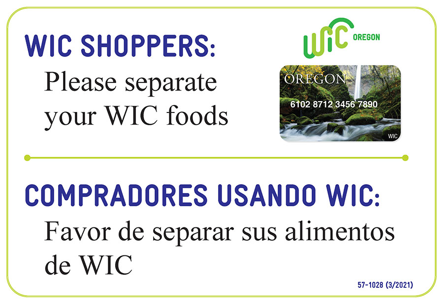 Sign readingWIC shoppers please separate your foods/Compradores usando WIC favor de separar sus alimentos de WIC