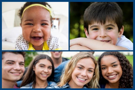 Head shot of baby with blue towel draped over head