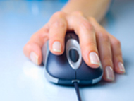 Hand resting on a computer mouse