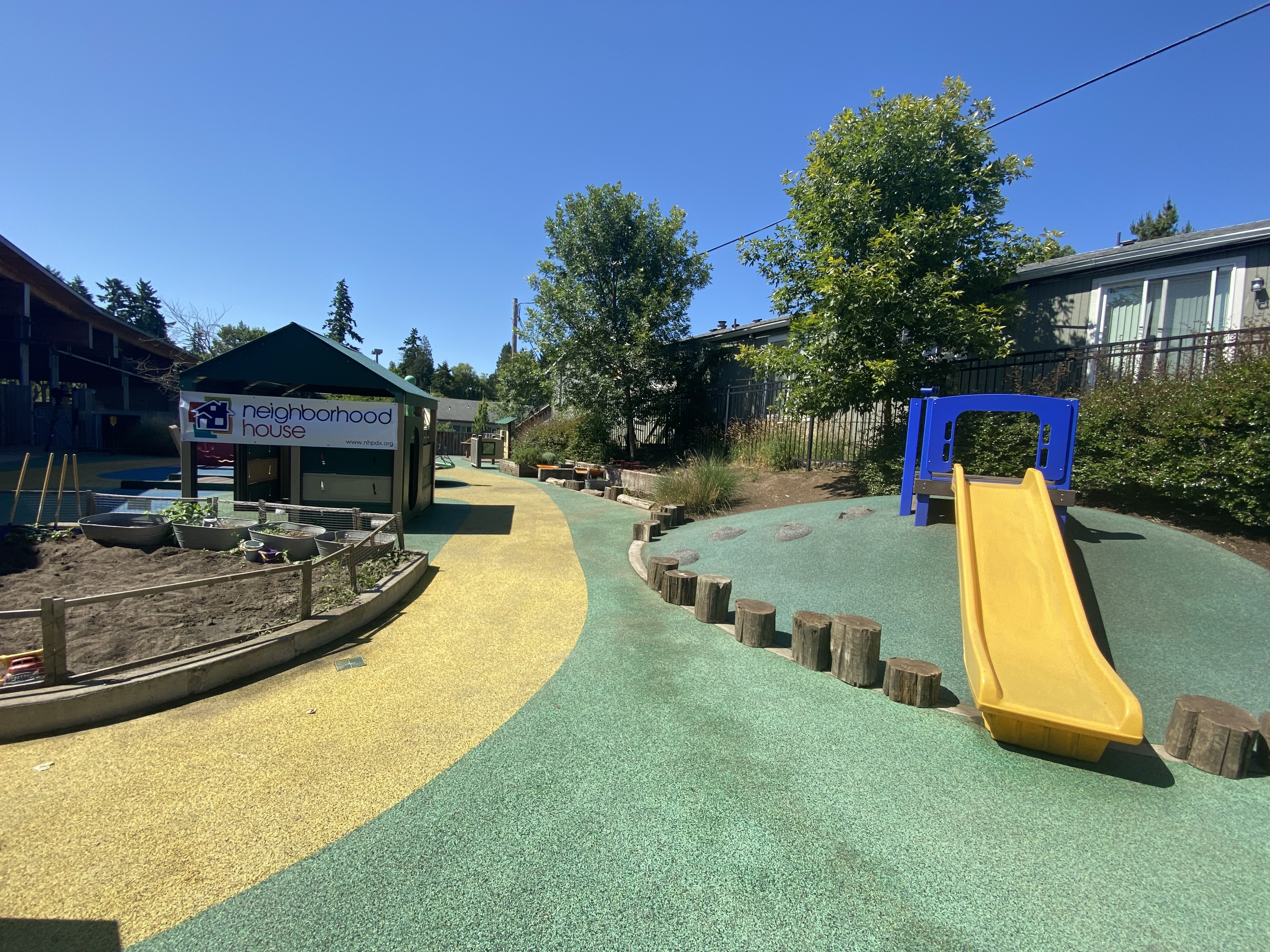 Playground with slide at affordable housing complex