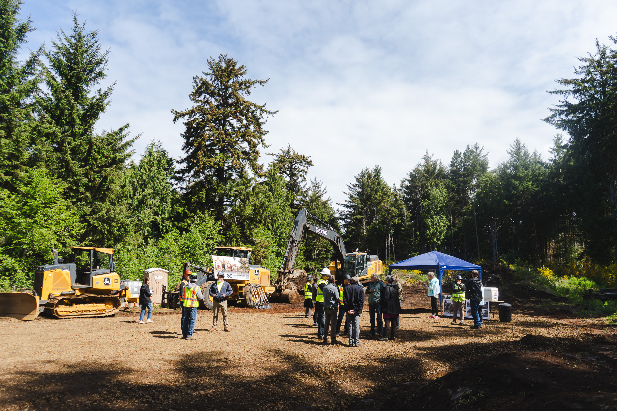photo of people gathered at a construction site