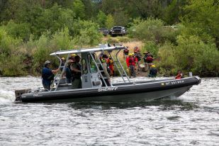 Students participating from a boat and onshore for training
