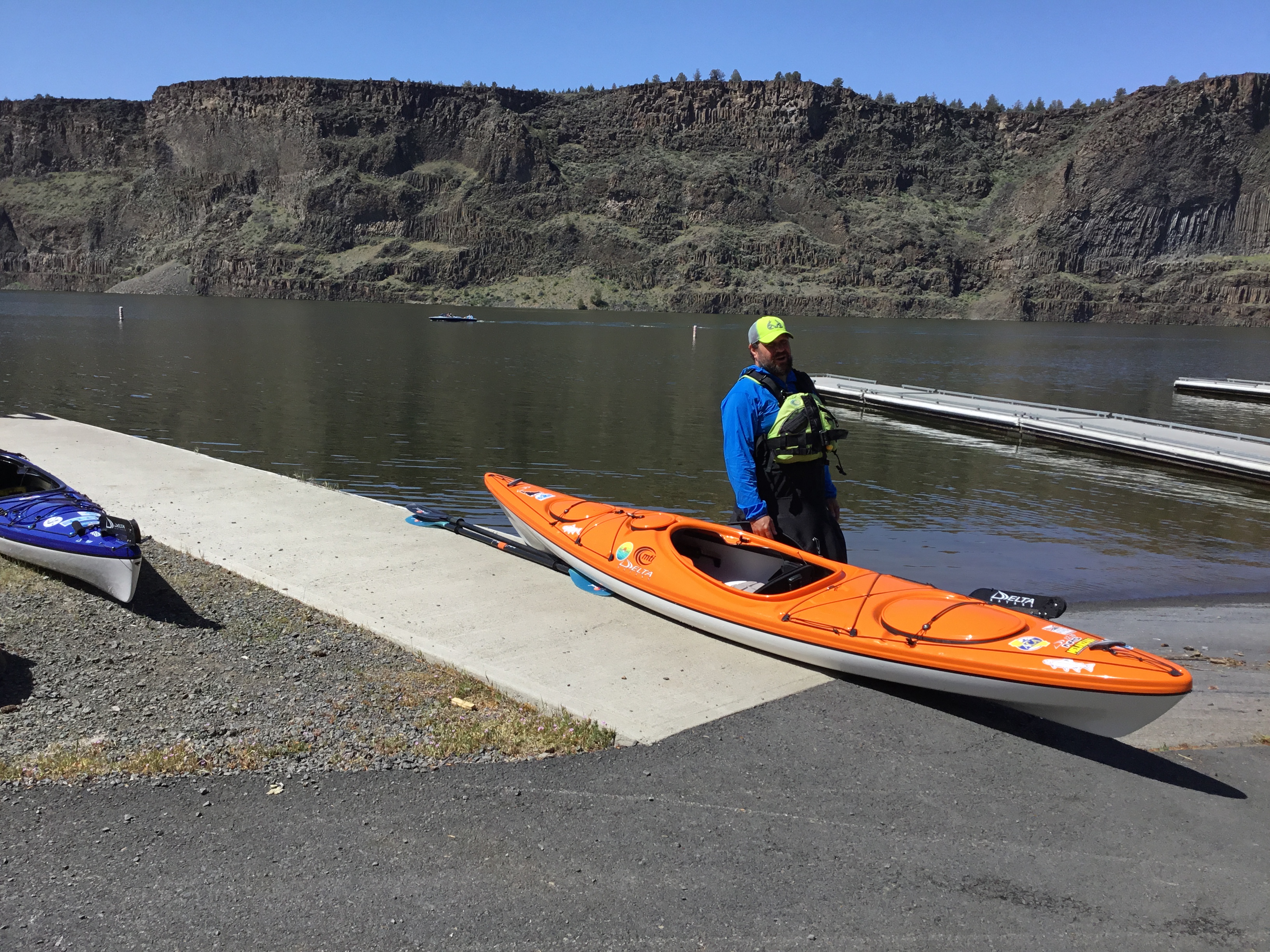Kayaker preparing to launch when no other trailered boats are launching