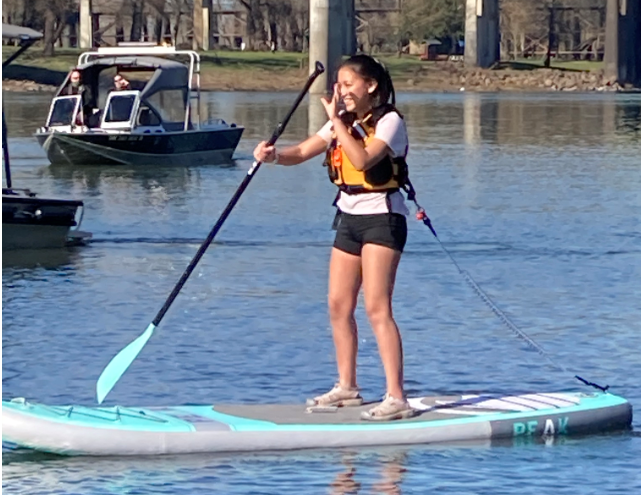 Image of a quick release leash for a stand up paddleboard on moving waters