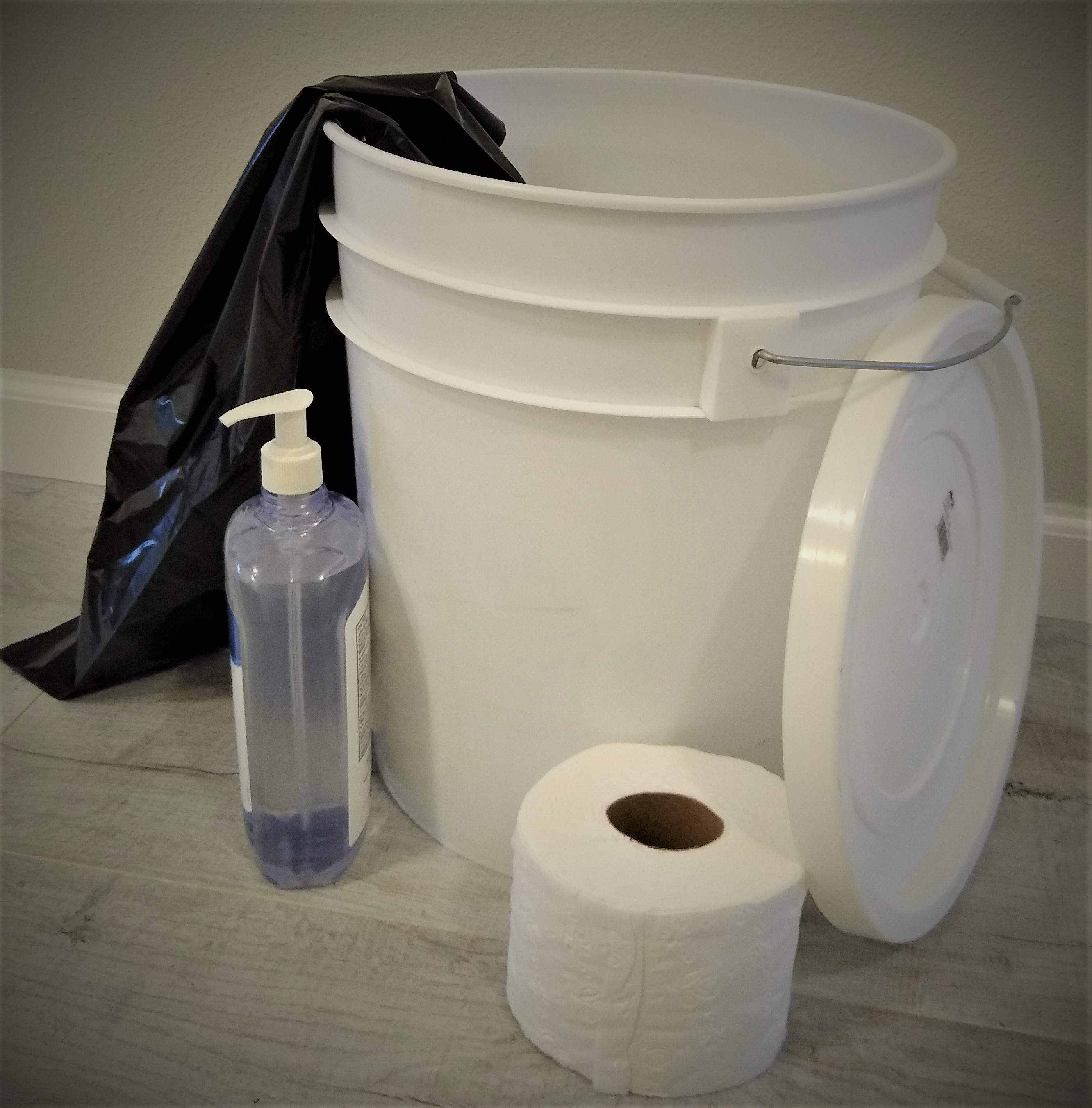 Pack important supplies! Waste bucket with lid, garbage bag, hand sanitizer and TP.