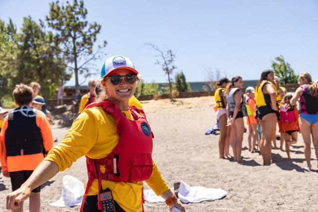 Picture of Fiona Wylde wither her competitive students donning life jackets.