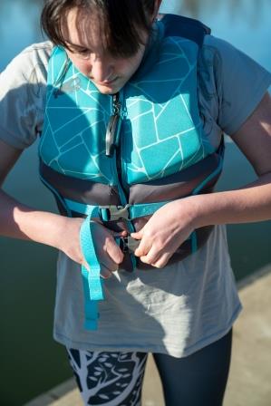 Prepare -connecting the buckles on a life jacket