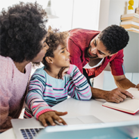 Photo of family sitting at kitchen table