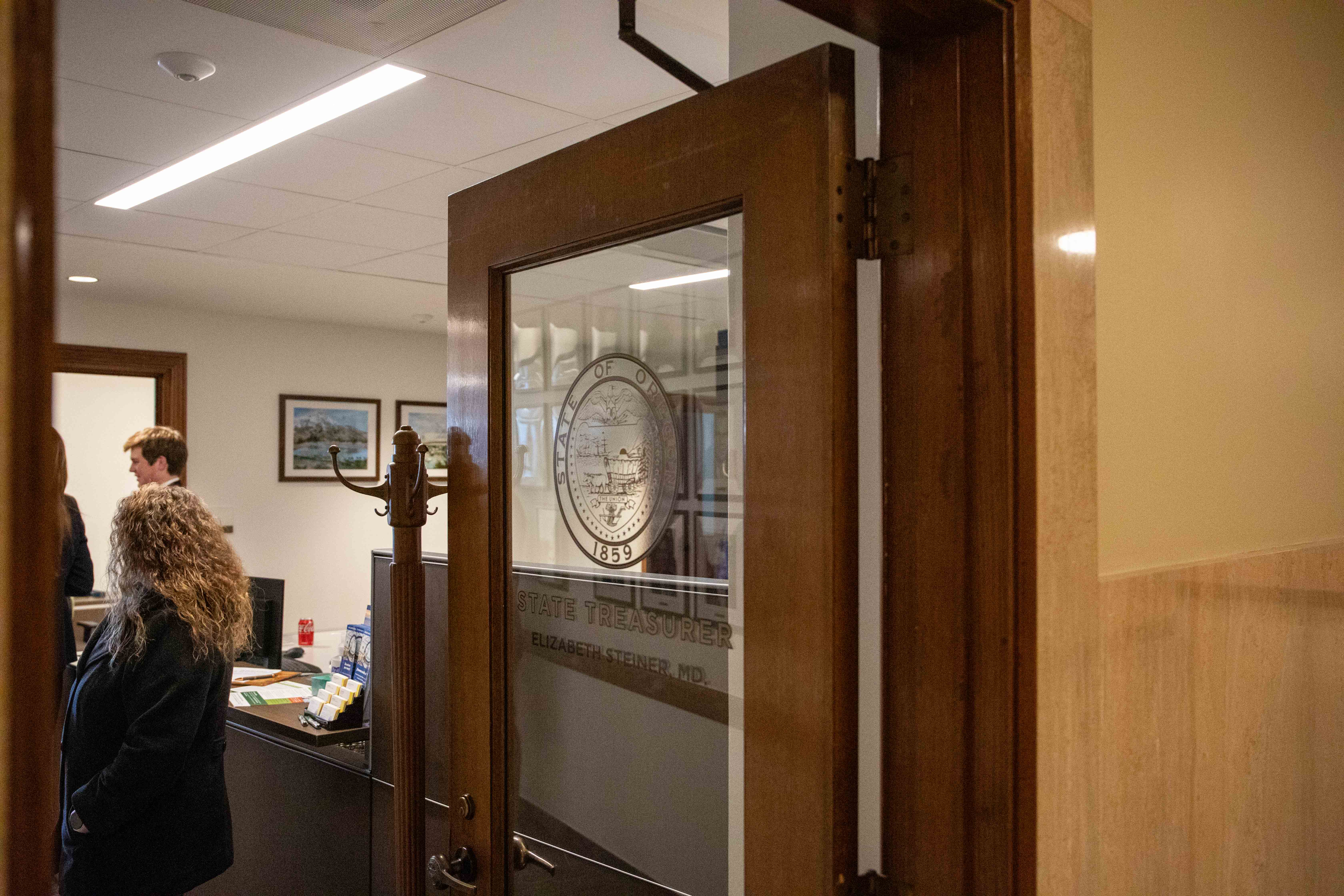 Picture of New office at capitols Door with treasury seal and Treasurer Steiners name